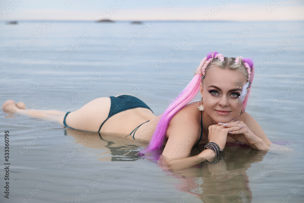 young beautiful woman in swimsuit