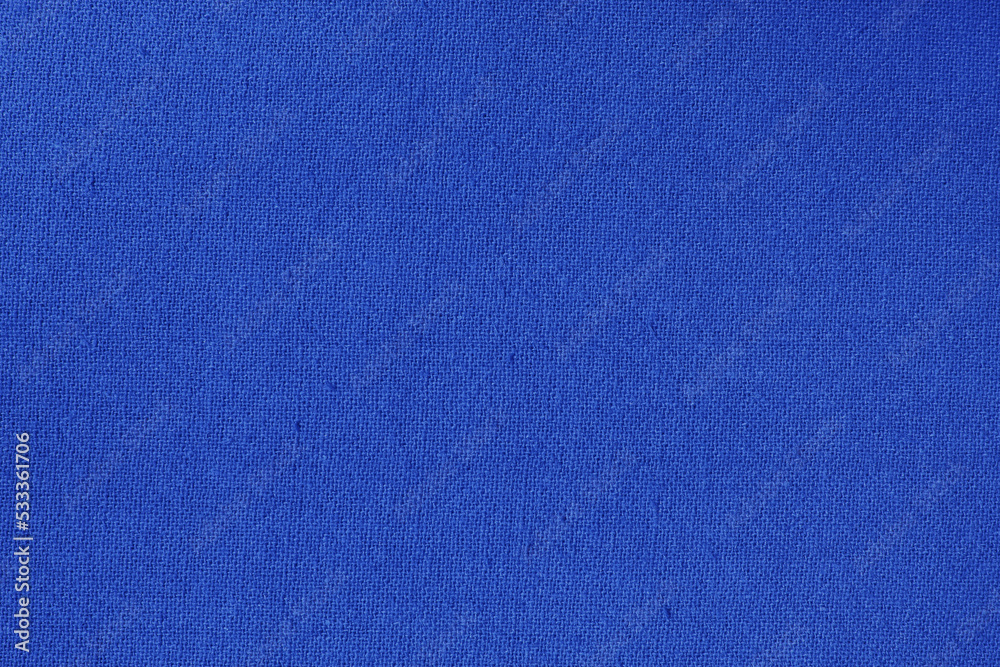 Dark blue cotton fabric cloth texture for background, natural textile pattern.