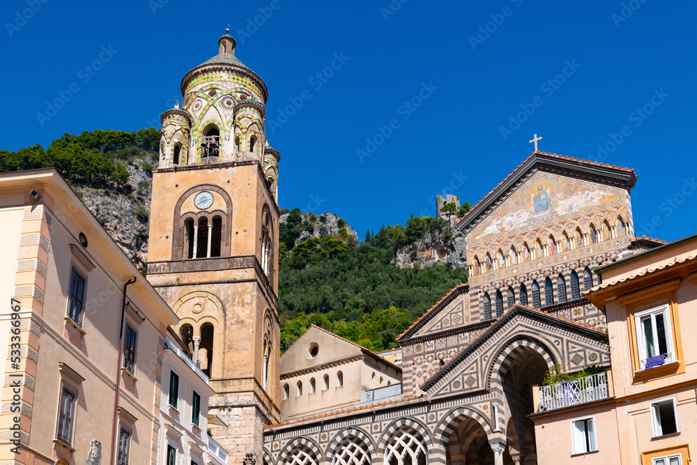 Amalfi Cathedral “Duomo di Amalfi Cattedrale di Sant'Andrea“ is a medieval Roman Catholic cathedral in the Piazza del Duomo, Amalfi, Italy. Coloruful facades and bell tower in world heritage village.