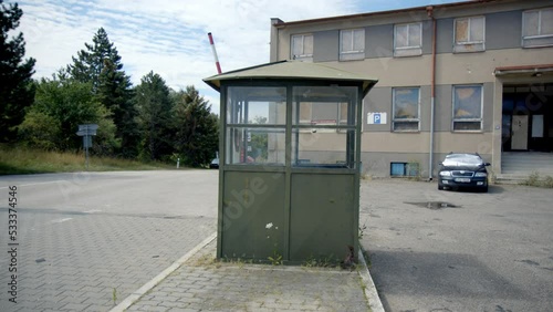 Empty Street With An Old Guard House And Barrier Gate, Soviet Border Post Between Austria And Czech Republic - panning photo