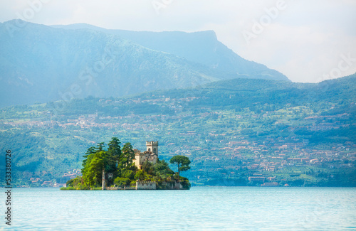 Lake Iseo with Loreto Island (Isola di Loreto) and Castello della Isola di Loreto, Italy photo