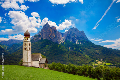 St Valentine's Church, Seis am Schlern, Italy, with the Impressive Mountain Schlern in the Background photo