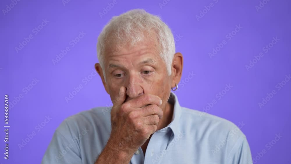 Sick ill tired elderly gray-haired man 70s wears blue shirt rub forehead suffer from migraine feel bad seedy isolated on plain light purple background studio portrait Sick ill tired elderly gray-haired man 70s wears blue shirt rub forehead suffer from migraine feel bad seedy isolated on plain light purple background studio portrait