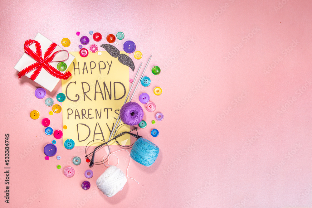 Happy Grandparents day greeting card background. Granny and grandpa's day celebration, with gift boxes, knitting threads, buttons, glasses, decor top view copy space