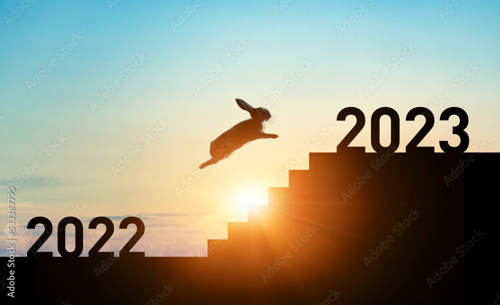 2022から2023へ階段を駆け上がるウサギ　2023年年賀状素材 - obrazy, fototapety, plakaty 