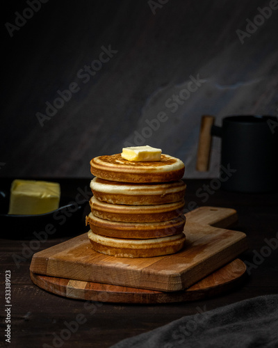 Pancake tower with butter and syrup