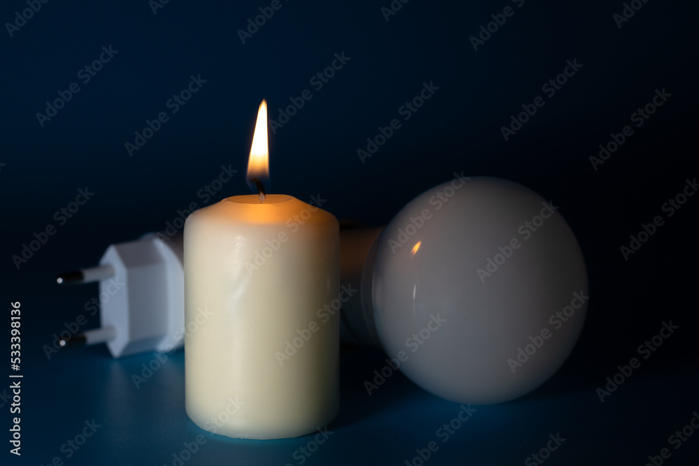 Energy price increase. Burning candles with an incandescent bulb on euro money. Increase in energy bill prices. Energy price increase. Burning candles with an incandescent bulb on euro money. Increase in energy bill prices.