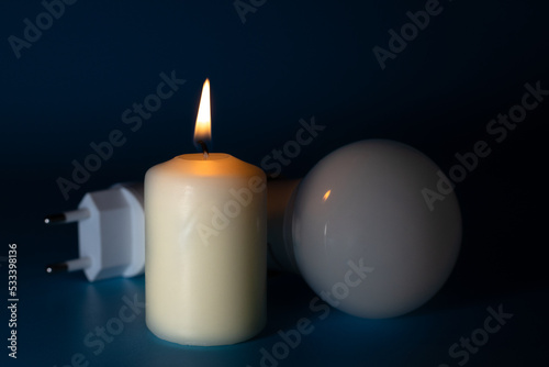Energy price increase. Burning candles with an incandescent bulb on euro money. Increase in energy bill prices.