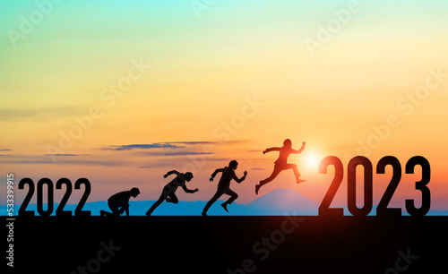 New year concept of 2023. New year's card. Running businessman.