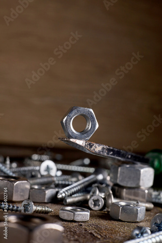 close-up industrial hardware objects on dark background