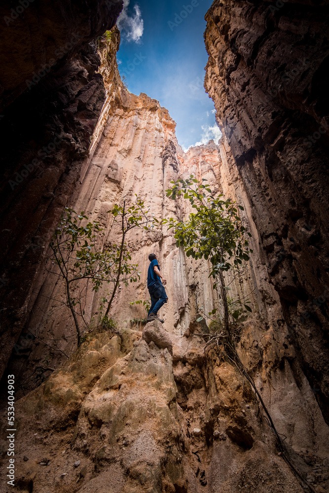 hiker in the canyon, Estoraques National park. 