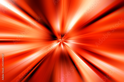 Abstract surface of radial blur zoom in red, coral and brown tones. Blurred red and coral background with radial, diverging, converging lines. 