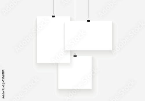Poster mockup with soft shadow. A4 sized paper frame mockup hanging with paper clip