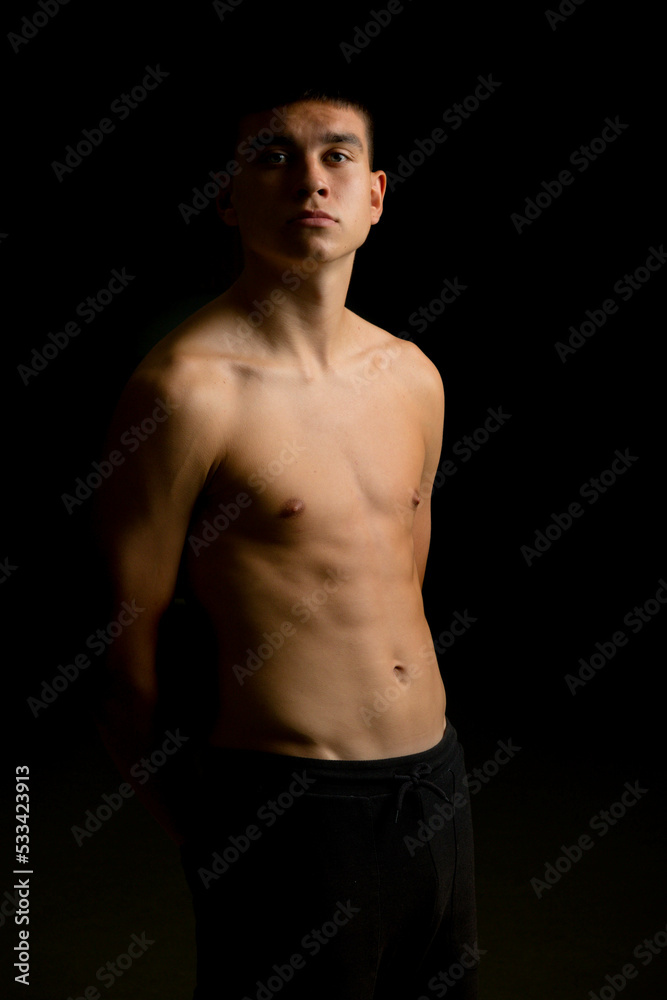 Fototapeta premium Nineteen year old teen boy shirtless