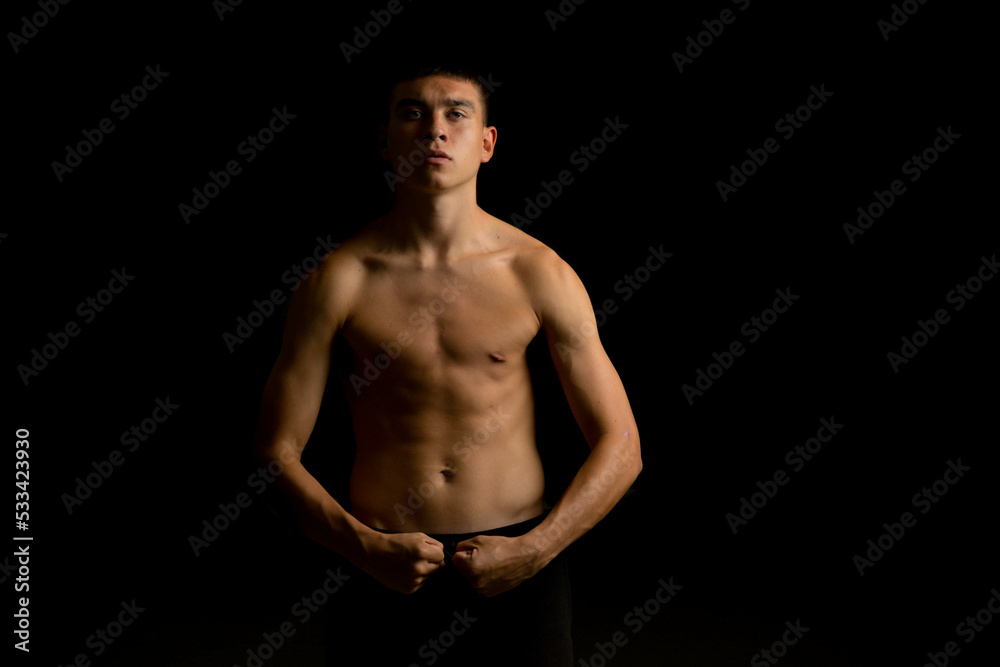 Nineteen year old teen boy shirtless portrait