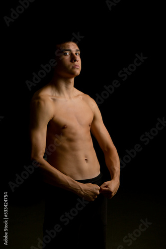 Nineteen year old teen boy shirtless portrait