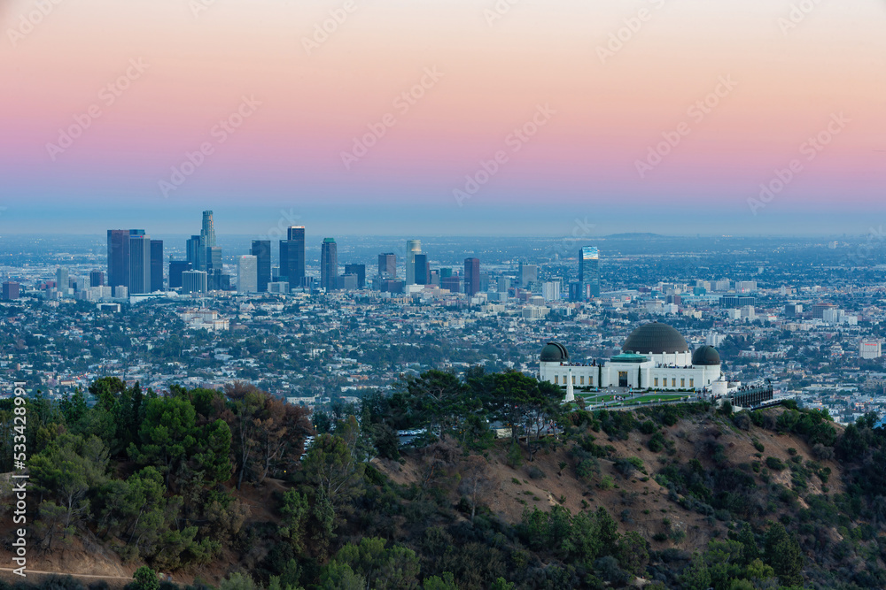 Sunset view of the Los Angeles cityscape with Griffith Observatory