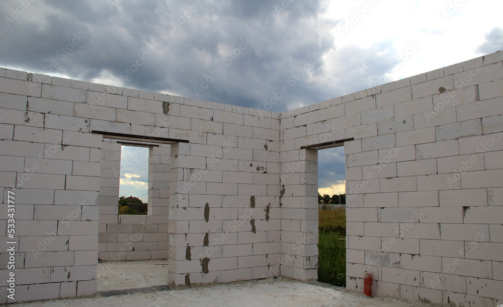 View inside country house made of foam concrete blocks in construction process 
