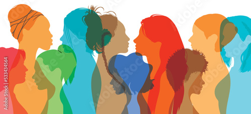 A woman in profile with multicultural and multiethnic women inside. The concept of racial equality, anti-racism, and supporting other women.