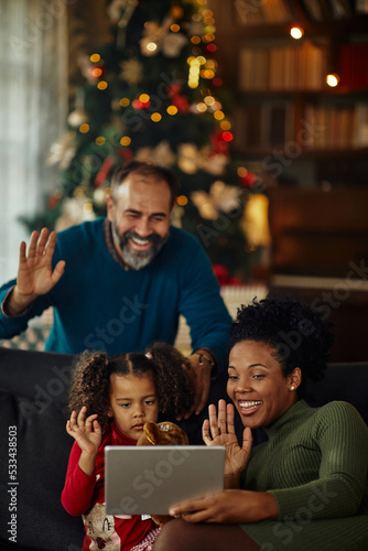 Family celebrating Christmas time via technology