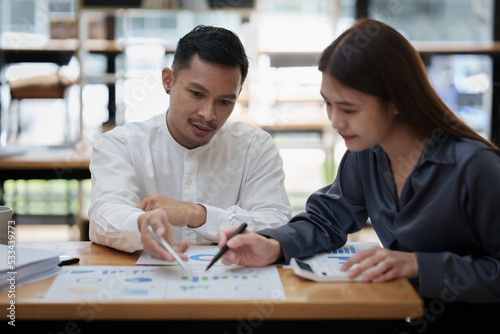 Business team hands at working with financial plan, meeting, discussion, brainstrom with tablet on office desk, Meeting concept