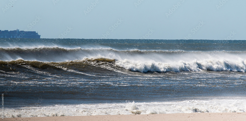 Rough and active Atlantic Ocean with a hurricane off shore Rough and active Atlantic Ocean with a hurricane off shore