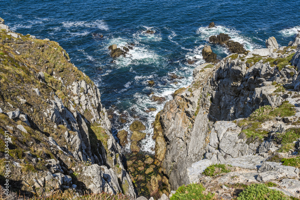 Landscape of rocks and ocean in the Crozon peninsula in France.