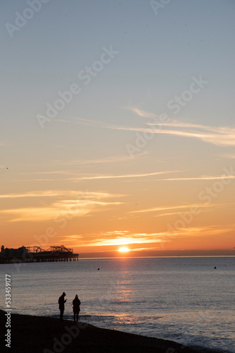 Sunrise off the coast in Brighton © SarahLouise
