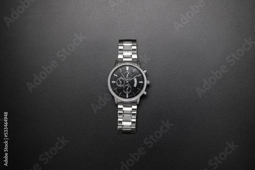 Luxury white chrome watch on black background