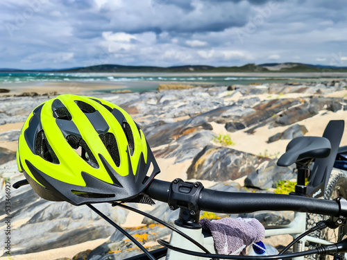 Concept of enjoying the outdoors by bicycle and boat at Gweebarra Bay , County Donegal - Ireland photo