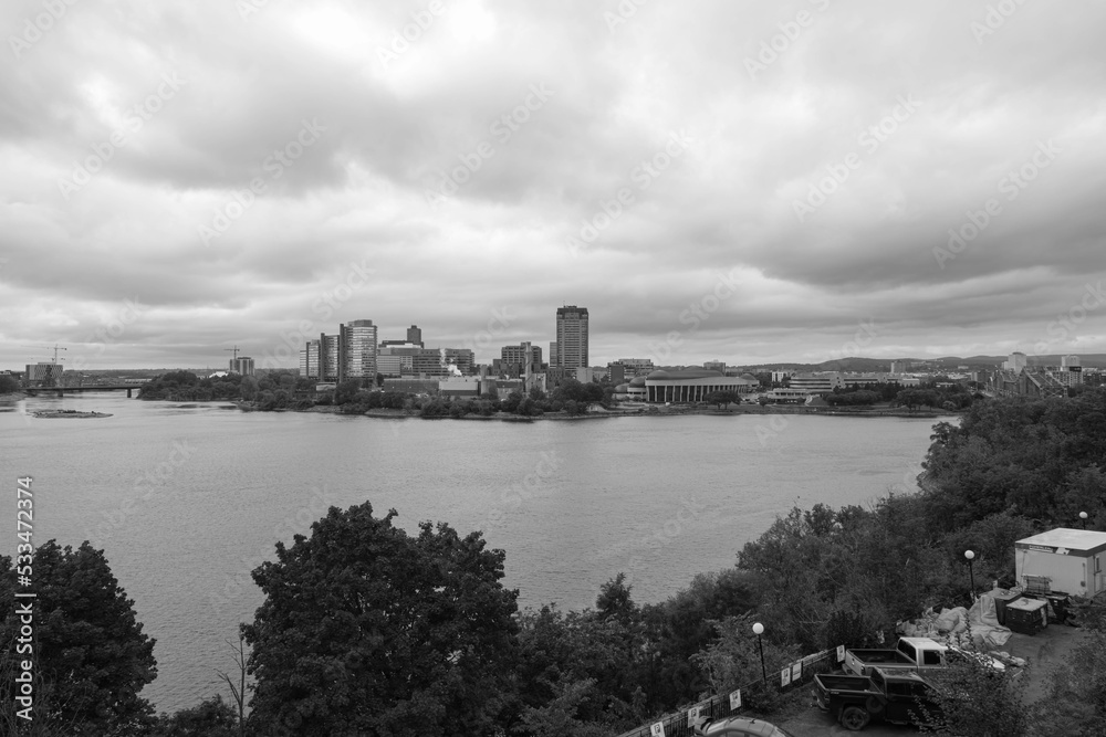 City scape with river and a cloudy sky