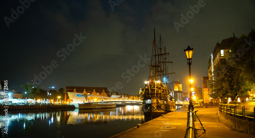 Picturesque summer evening panorama of the architectural pier of the Old Town GDANSK, POLAND © Андрей Трубицын