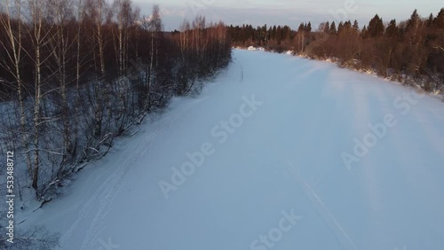 Scenic view of the snowy river photo