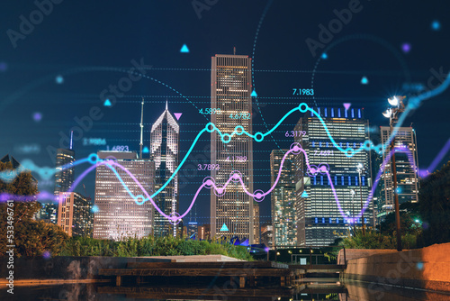 Chicago downtown area city view, Millennium Park area, night time, Illinois, USA. Skyscrapers. Forex graph hologram. The concept of internet trading, brokerage and fundamental analysis © VideoFlow
