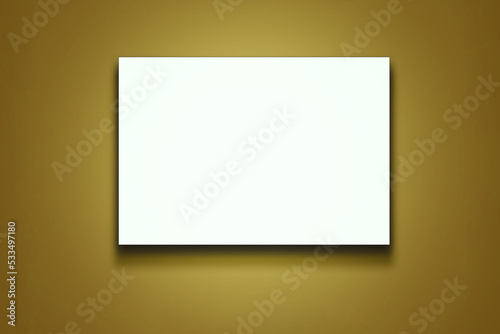 Blank white isolated signboard with rough shadow fixed on yellow wall