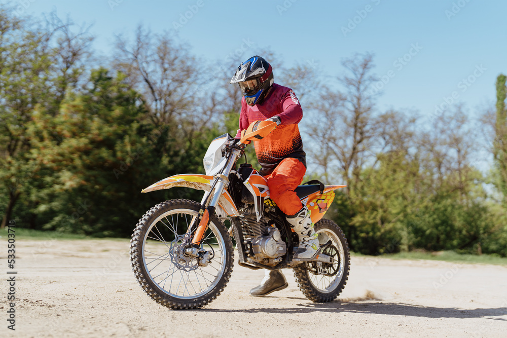 Extreme and Adrenaline. Motocross rider in action. Motocross sport. Active lifestyle. Extreme and Adrenaline. Motocross rider in action. Motocross sport. Active lifestyle.