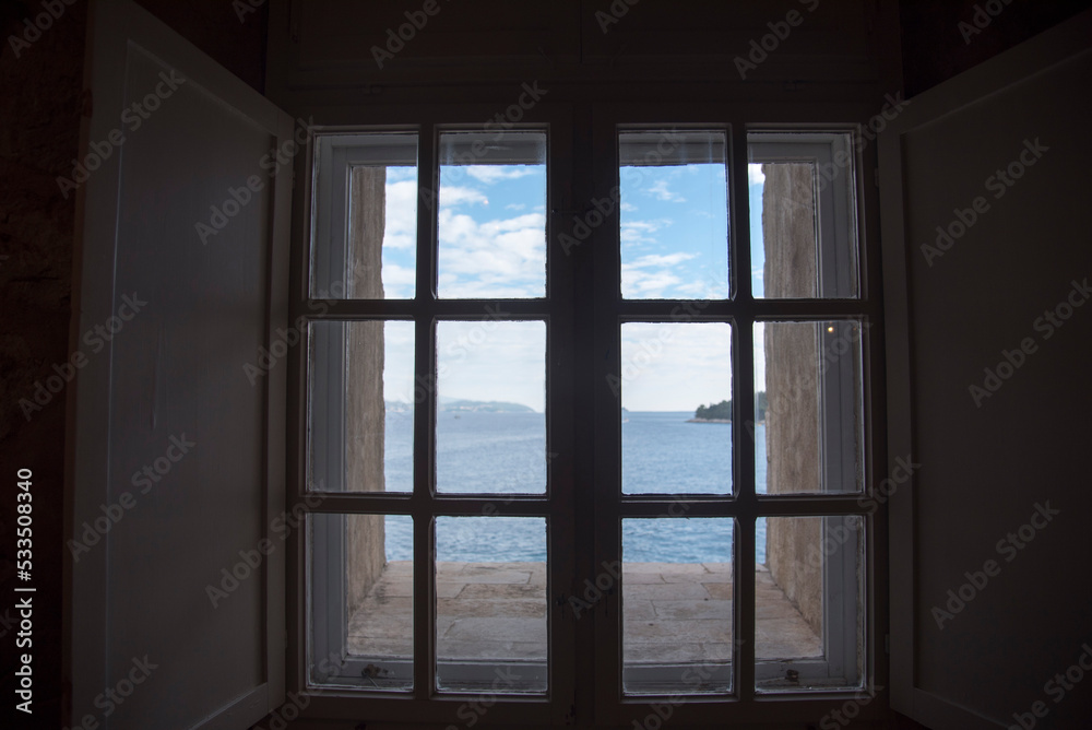 Looking out of a window in Dubrovnik Looking out of a window in Dubrovnik
