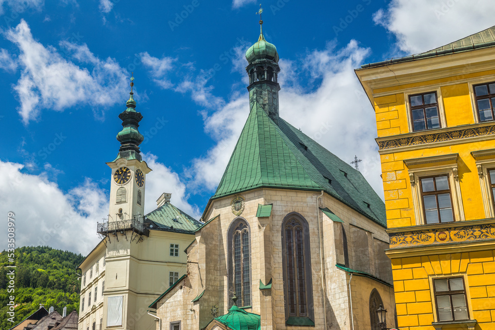 Town hall with St. Catherine's church in Banska Stiavnica, Slovakia, Europe.