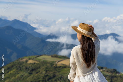 Tourist woman on the mountain photo