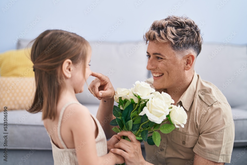 Father and daughter father and daughter surprise with flowers at home