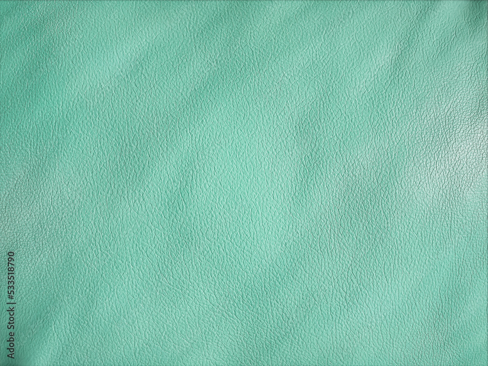 Blue-green suede leather showing fine dimpled texture and irregular ...
