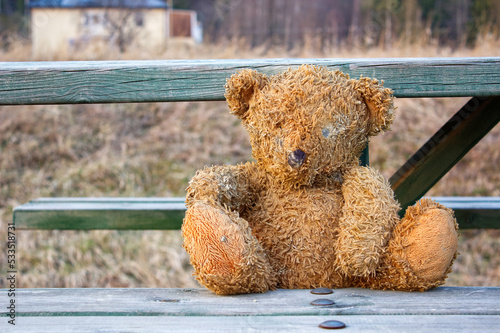 Teddy bear on a bench