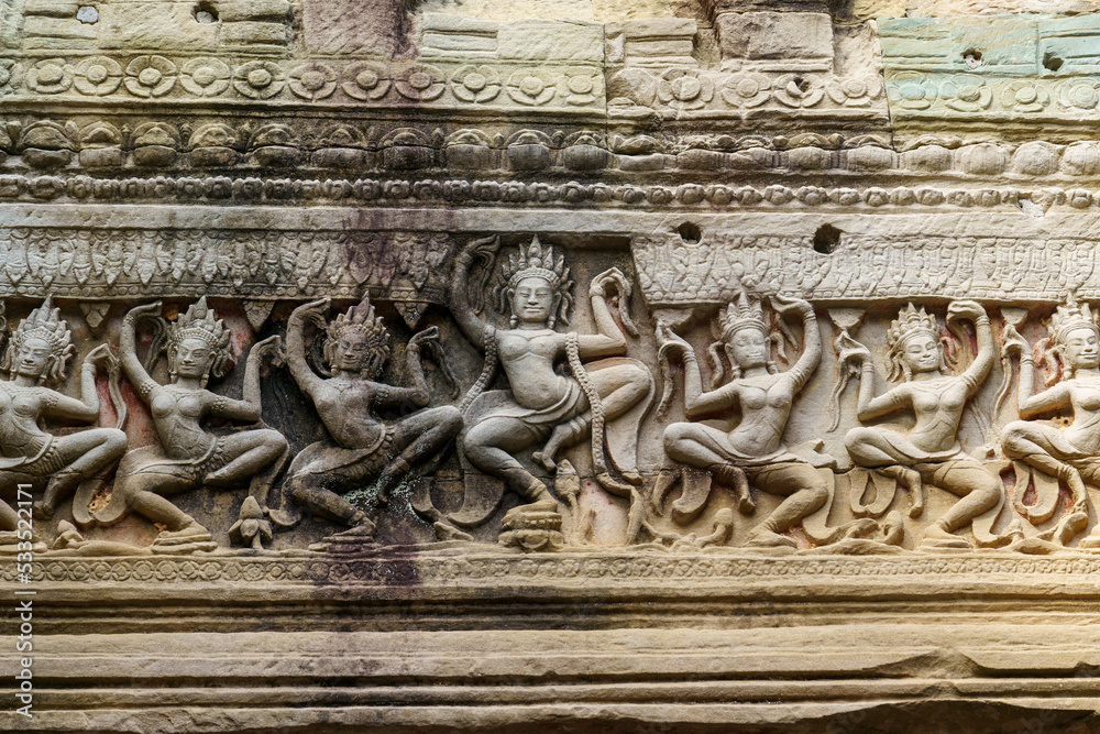 Fototapeta premium Cambodia. Siem Reap. The archaeological park of Angkor. A bas relief sculpture of apsara dancer at Preah Khan 12th century Hindu temple