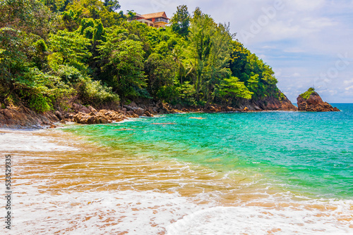 Secret Banana Beach bay panorama turquoise clear water Phuket Thailand.