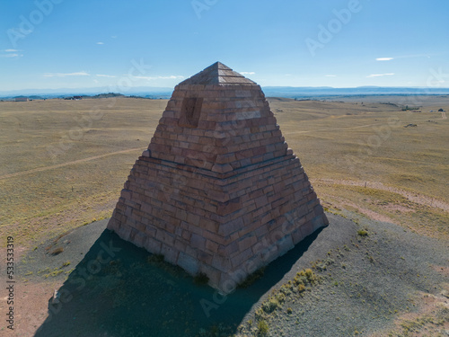 Ames monument Bosler and Laramie Wyoming - Large pyramid with stones for a persons memorial and remembrance - Drone Aerial Photo photo