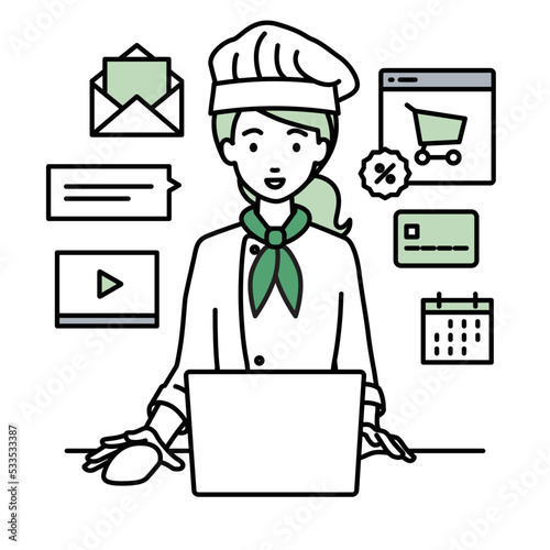 デスクで座ってPCでネットショップやマーケティングの仕事をしている調理師の女性