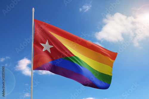 Photography Cuba flag with rainbow colors on sky background