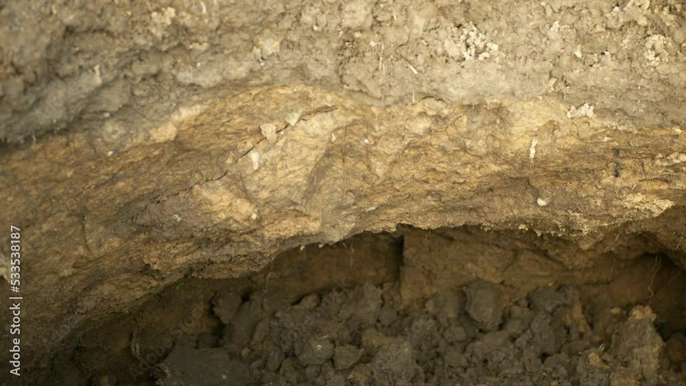 Fields subsoil erosion damage tractor track hole pit soil inappropriately managed earth land degradation field. Intensive agriculture. Vadose zone poor farm farming without trees draws.