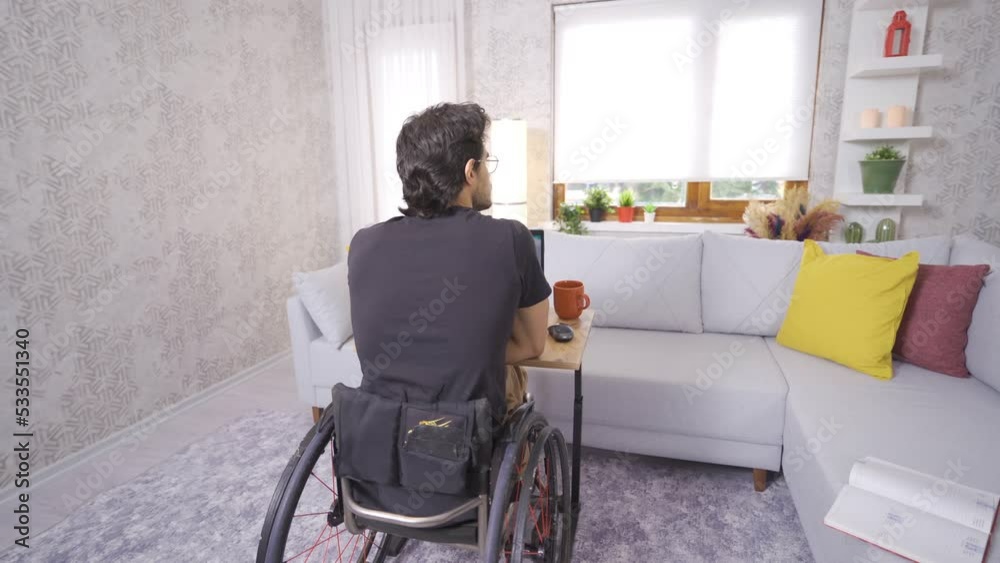 Disabled young man sits in wheelchair and works with laptop.
Disabled teenager in wheelchair working with laptop at home.
Disabled young man sits in wheelchair and works with laptop.
Disabled teenager in wheelchair working with laptop at home.