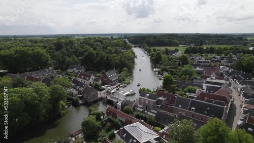 Drone view over quaint village Loenen and its drawbridge over river Vecht photo